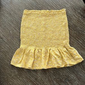 super cute yellow mini skirt. Perfect for summer.